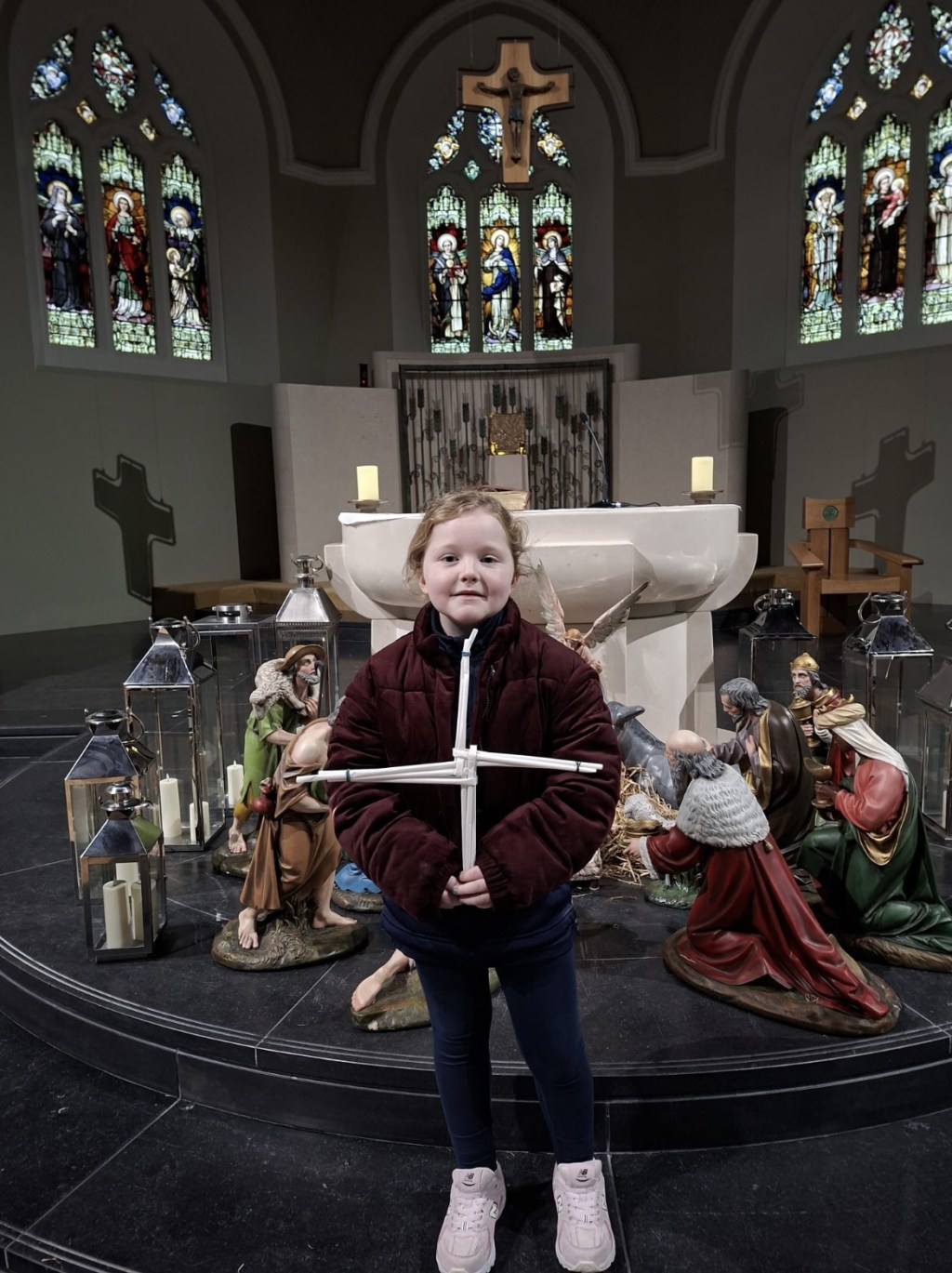 Emily (P3) makes a St Brigid’s Cross